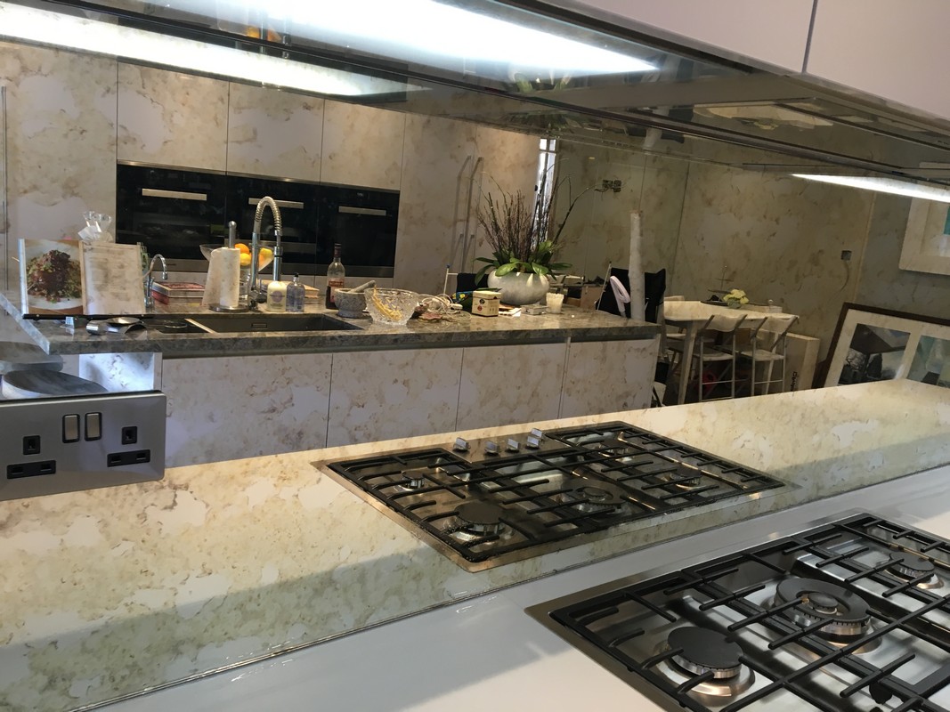Mirror glass splashback in Totteridge luxury kitchen