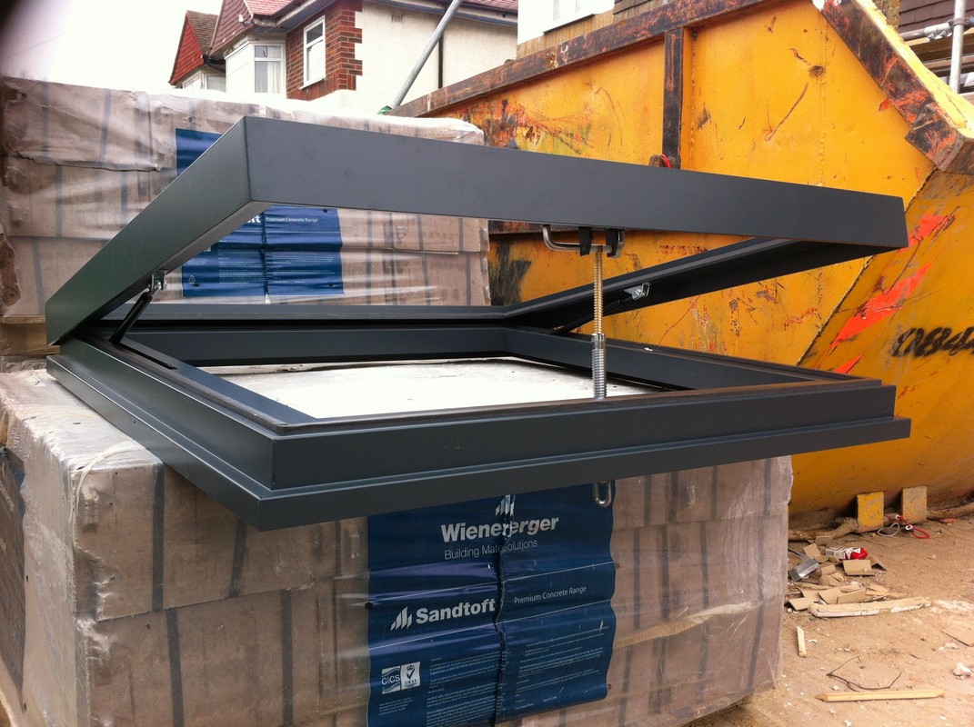 Opening flat roof skylight in anthracite grey installed in Totteridge